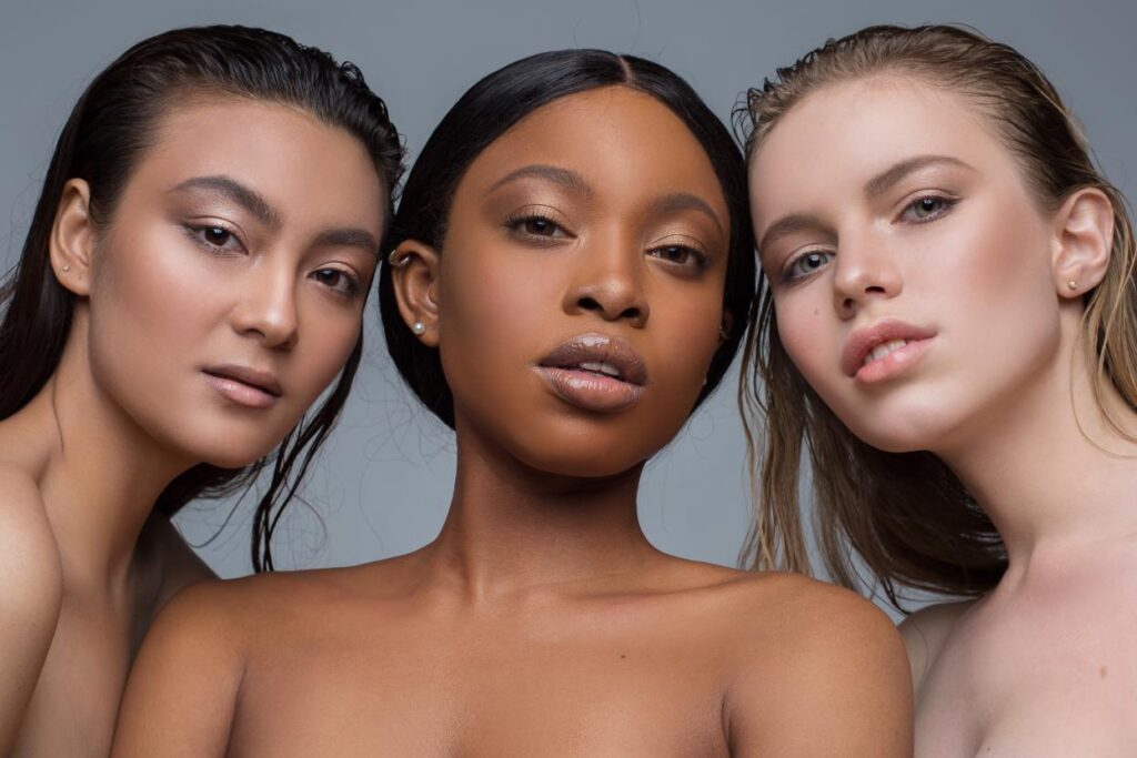 Three women with glowing skin representing the results of med spa treatments.