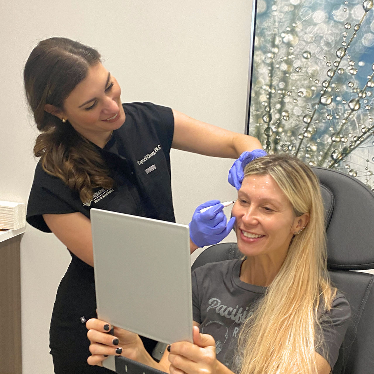 Radiance Rx Skin & Aesthetics provider showing satisfied patient treatment areas